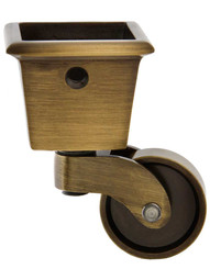 Large Square-Cup Caster with 1 1/4 inch Brass Wheel in Antique Brass.